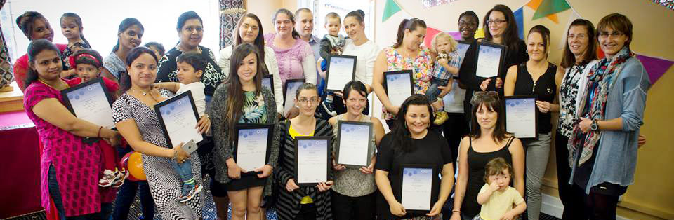 Parents giving their feedback receiving certificates on completion of Flying Start