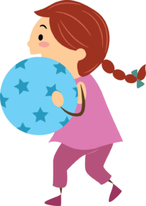 This is an image of a young girl holding a ball as if she is just about to throw it or has just caught it